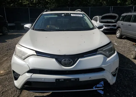 2016 Toyota Rav4 Limited z USA, uszkodzony, nr VIN JTMDFREVXGJ077570